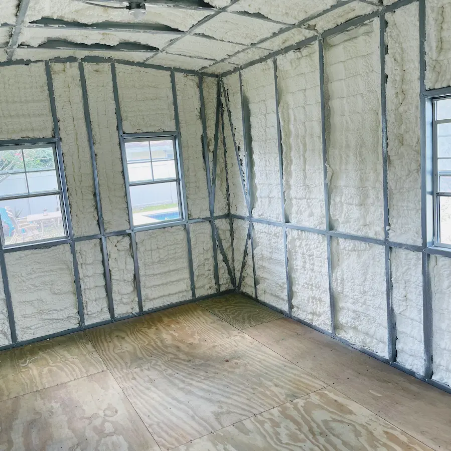 Closed-cell spray foam insulation applied to wall cavities in a residential project in Shelton